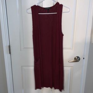 Sleeveless wrap with pockets